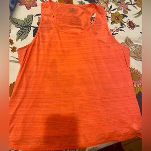 Champion Work Out Orange Tank XL, thin and fairly sheer. Great condition